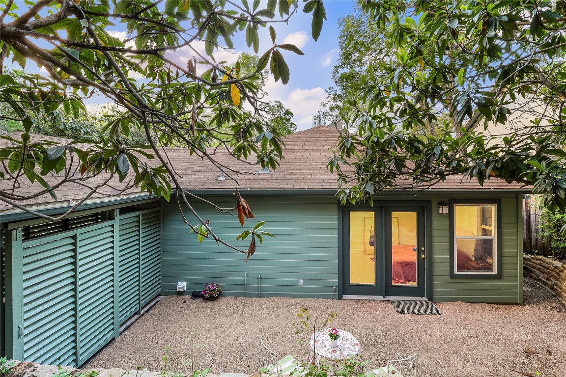803 Rutherford Place Austin, TX 78704 - Photo 21 of 28 a front view of a house with a garden