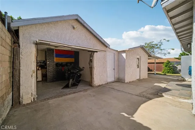 a view of a garden with potted plants