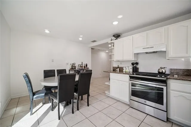 a bedroom with a bed and a desk