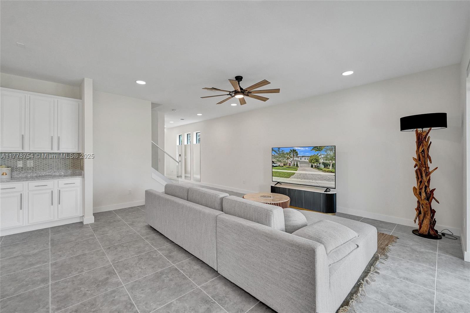 1348 Silk Oak Drive Hollywood, FL 33021 - Photo 14 of 100 a living room with furniture and a ceiling fan