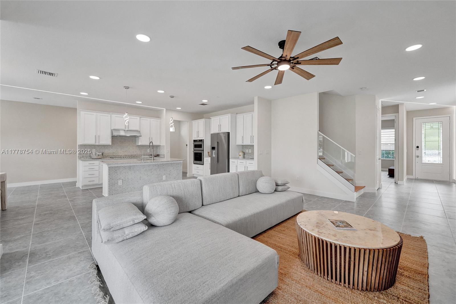 1348 Silk Oak Drive Hollywood, FL 33021 - Photo 15 of 100 a living room with furniture and a view of kitchen