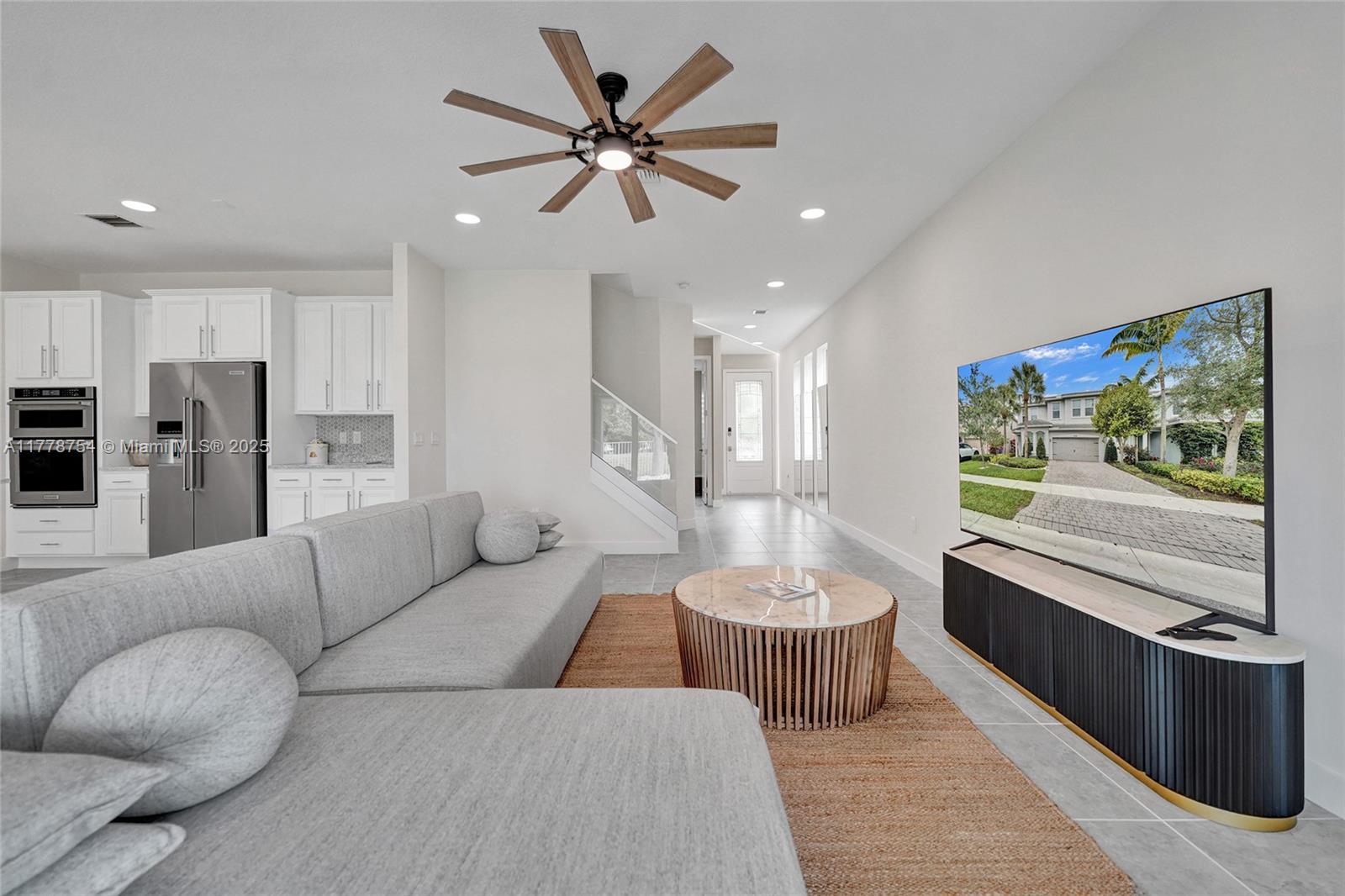 1348 Silk Oak Drive Hollywood, FL 33021 - Photo 16 of 100 a living room with furniture and a large window