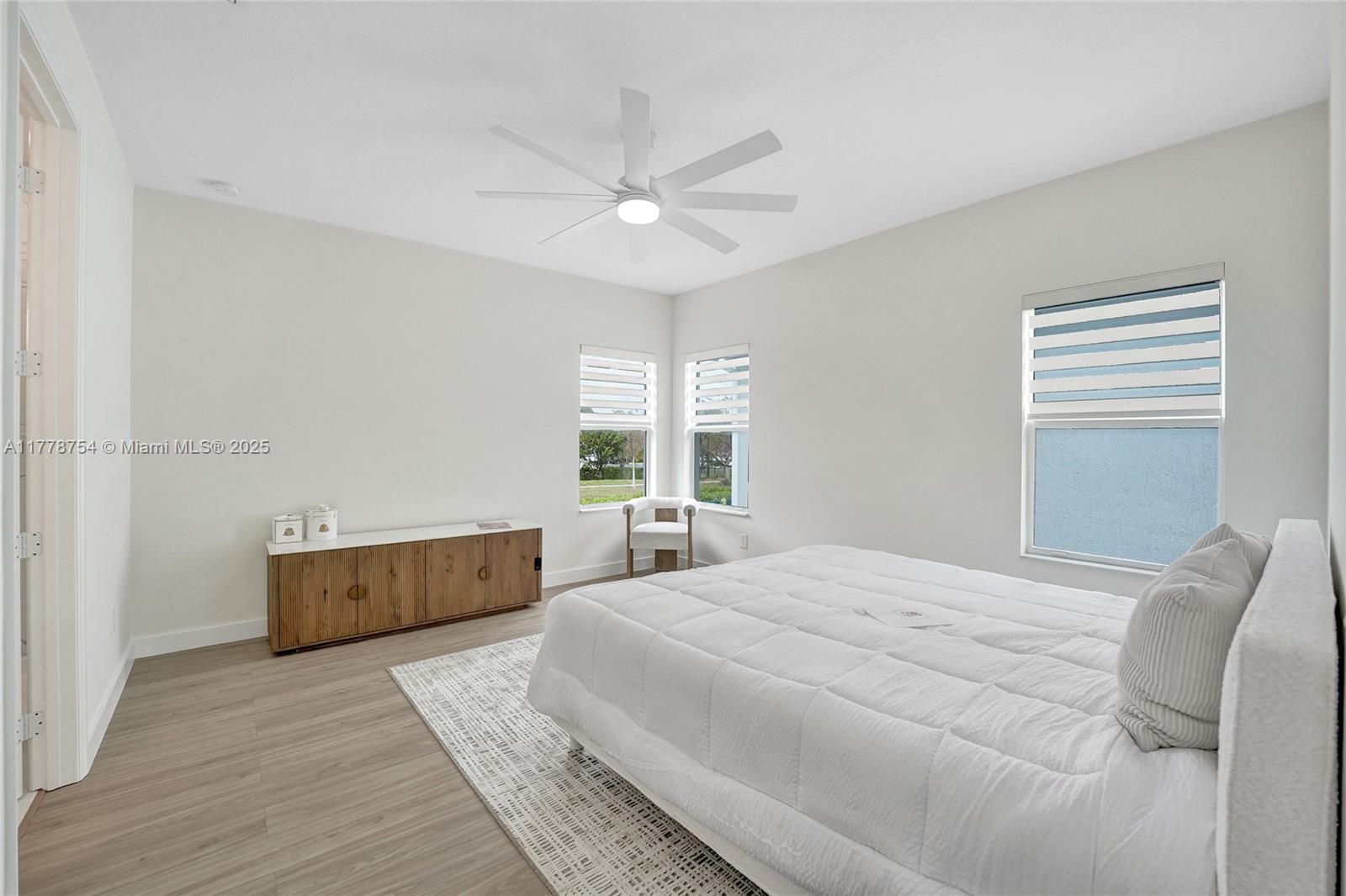 1348 Silk Oak Drive Hollywood, FL 33021 - Photo 39 of 100 a bedroom with a large bed and a window