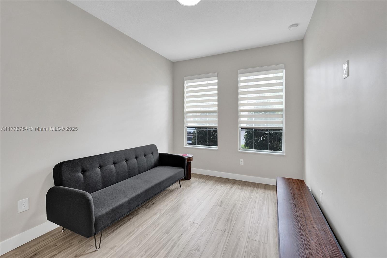1348 Silk Oak Drive Hollywood, FL 33021 - Photo 4 of 100 a living room with furniture and a large window