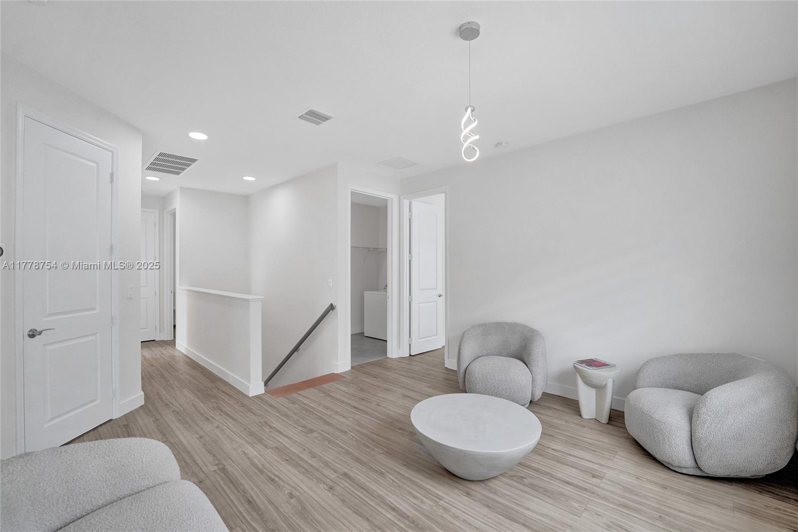 1348 Silk Oak Drive Hollywood, FL 33021 - Photo 51 of 100 a living room with furniture and a wooden floor