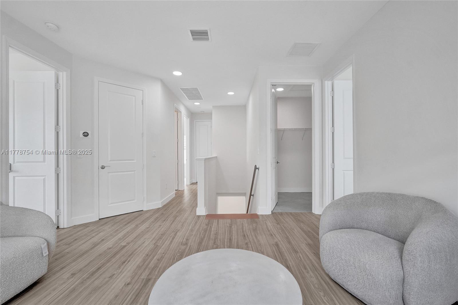 1348 Silk Oak Drive Hollywood, FL 33021 - Photo 52 of 100 a living room with furniture and a wooden floor