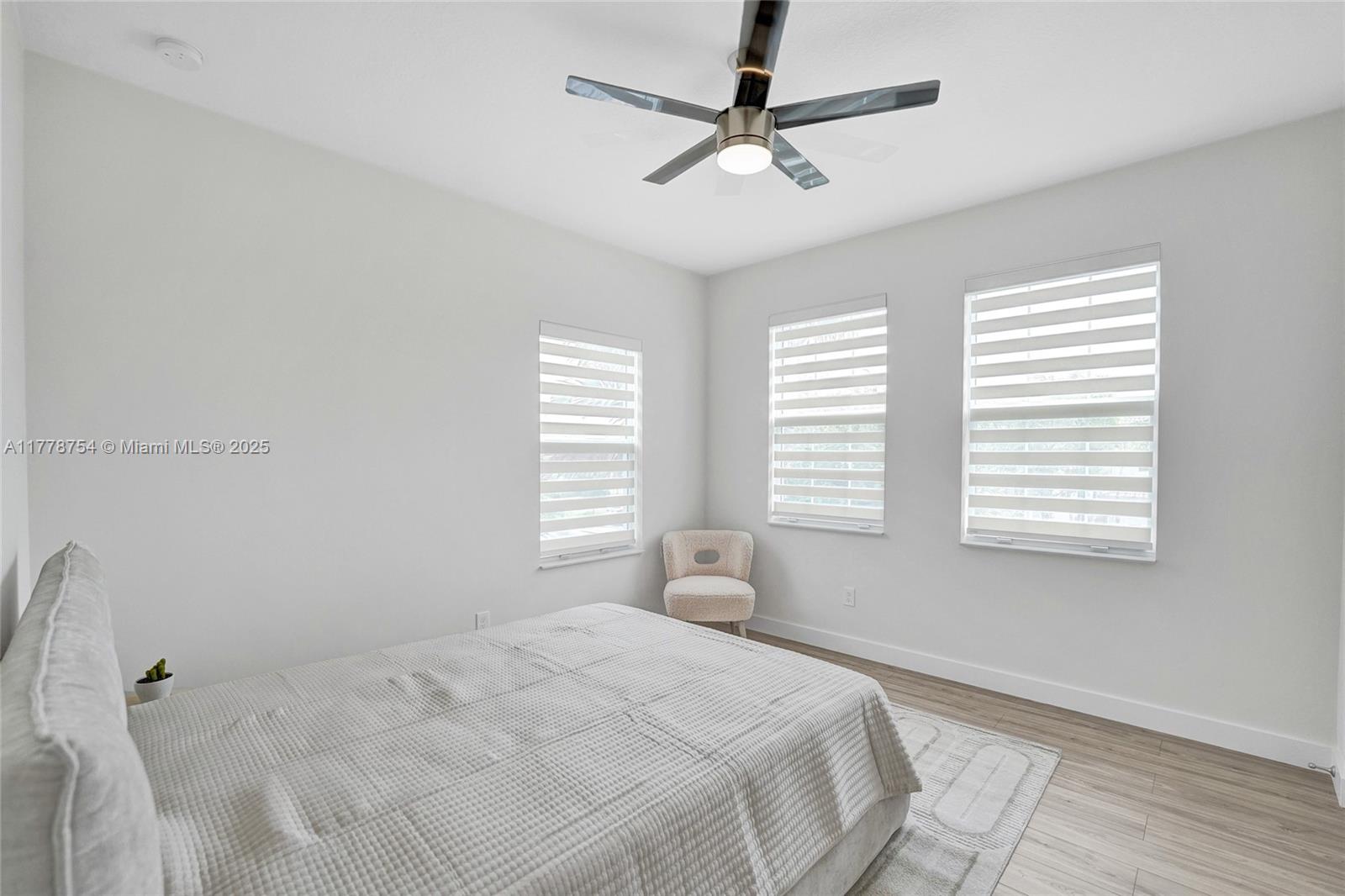 1348 Silk Oak Drive Hollywood, FL 33021 - Photo 54 of 100 a bedroom with a bed and a window