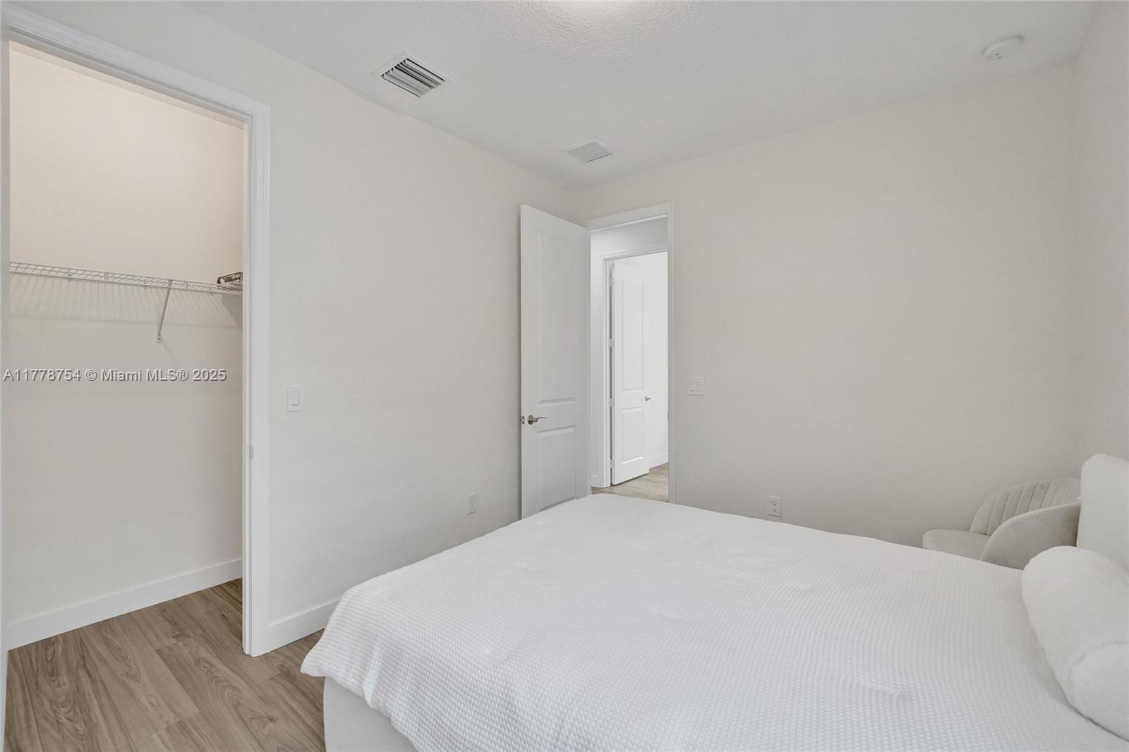 1348 Silk Oak Drive Hollywood, FL 33021 - Photo 64 of 100 a bedroom with a bed and a closet