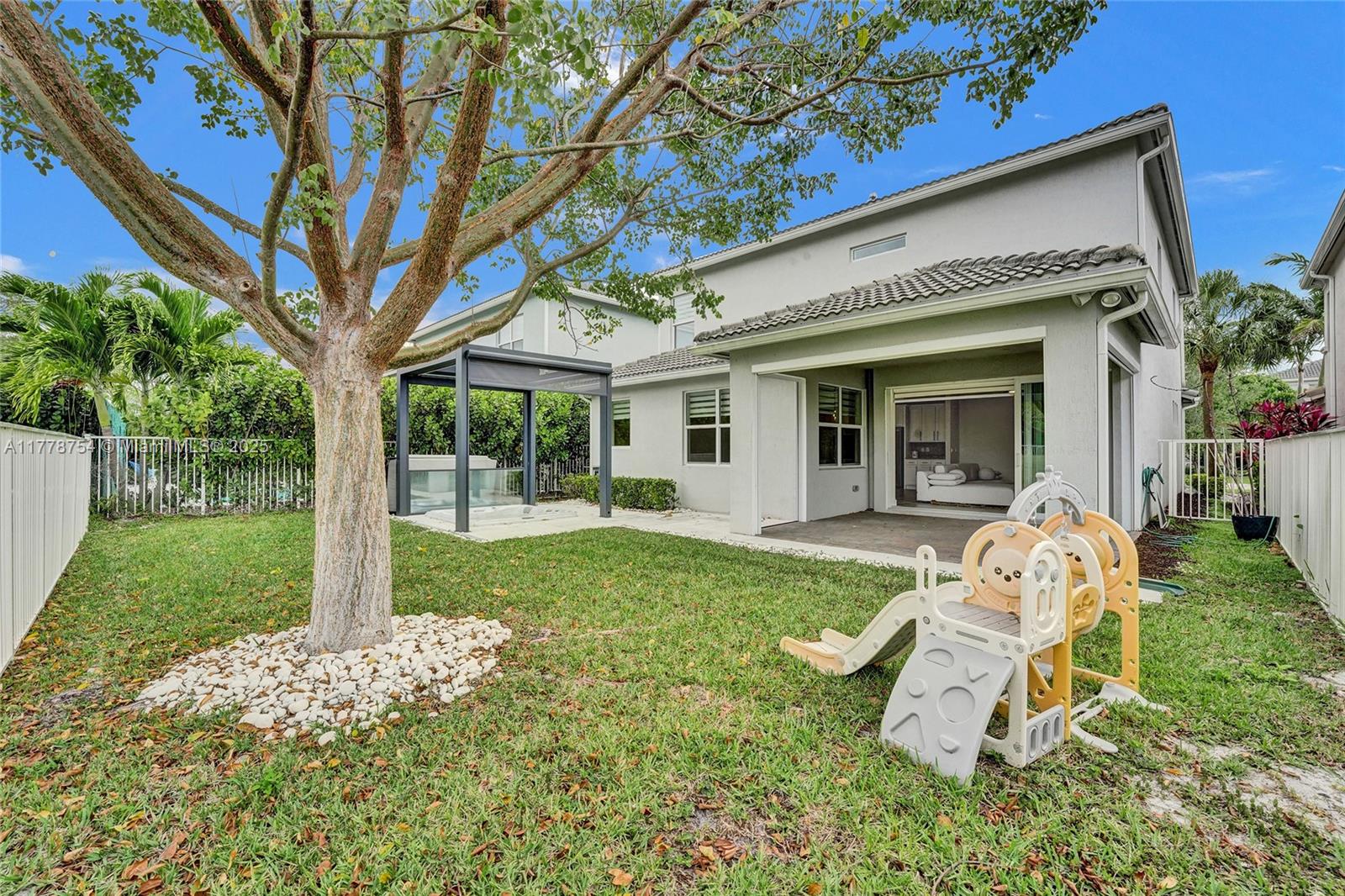 1348 Silk Oak Drive Hollywood, FL 33021 - Photo 73 of 100 front view of a house with a yard