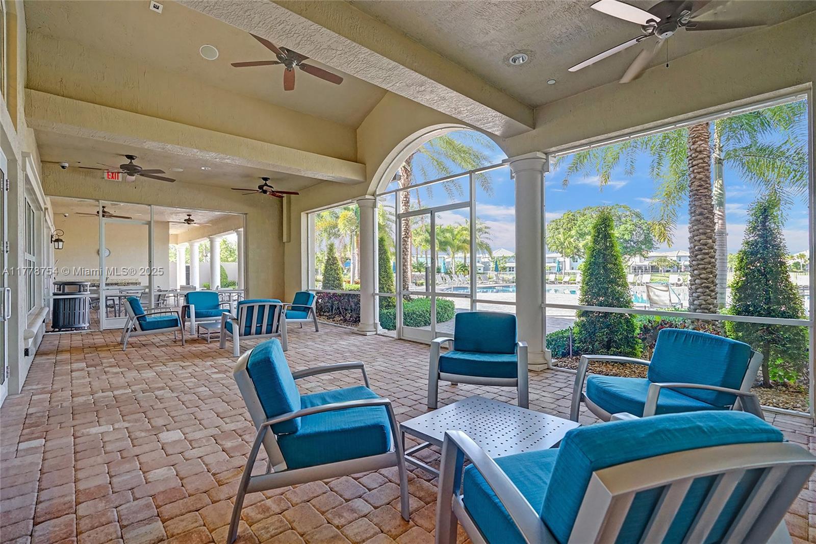 1348 Silk Oak Drive Hollywood, FL 33021 - Photo 97 of 100 a large living room with large windows