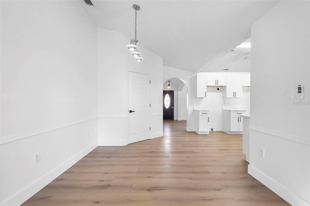 4395 Comfort Street Cocoa, FL 32927 - Photo 17 of 44 a view of empty room with wooden floor