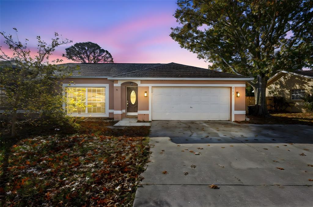 4395 Comfort Street Cocoa, FL 32927 - Photo 3 of 44 a front view of a house with a yard