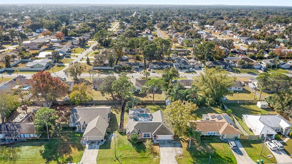 4395 Comfort Street Cocoa, FL 32927 - Photo 42 of 44 an aerial view of residential houses with yard