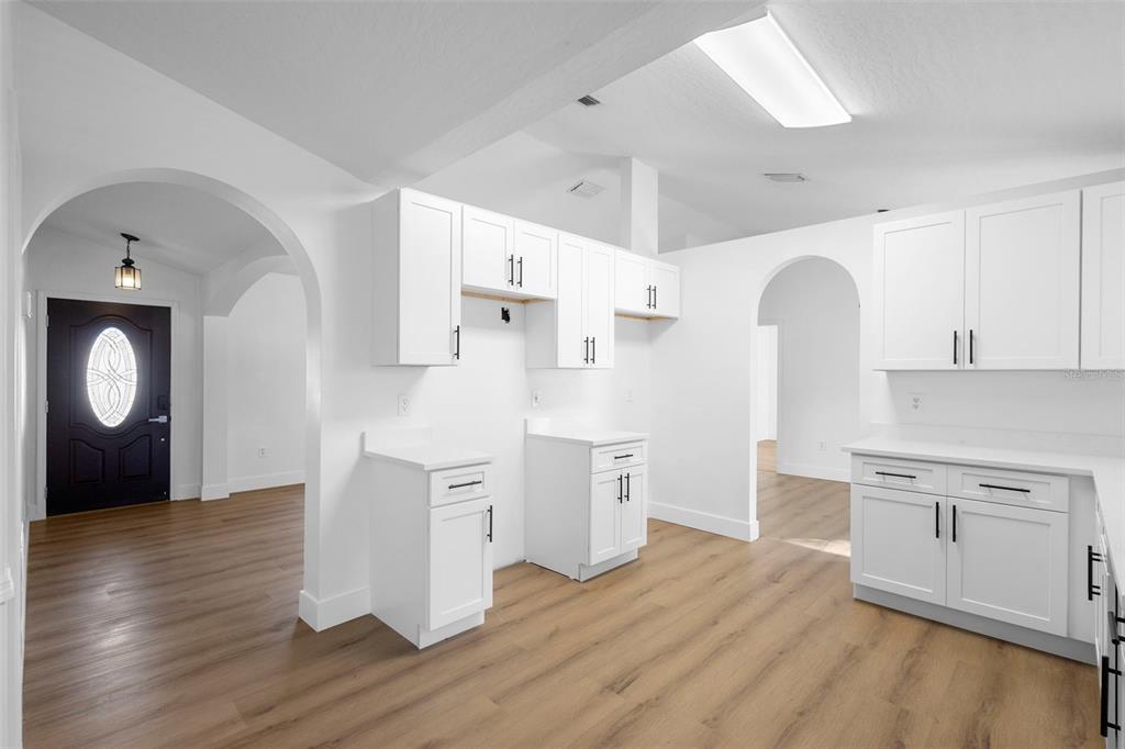 4395 Comfort Street Cocoa, FL 32927 - Photo 8 of 44 a view of a kitchen with wooden floor