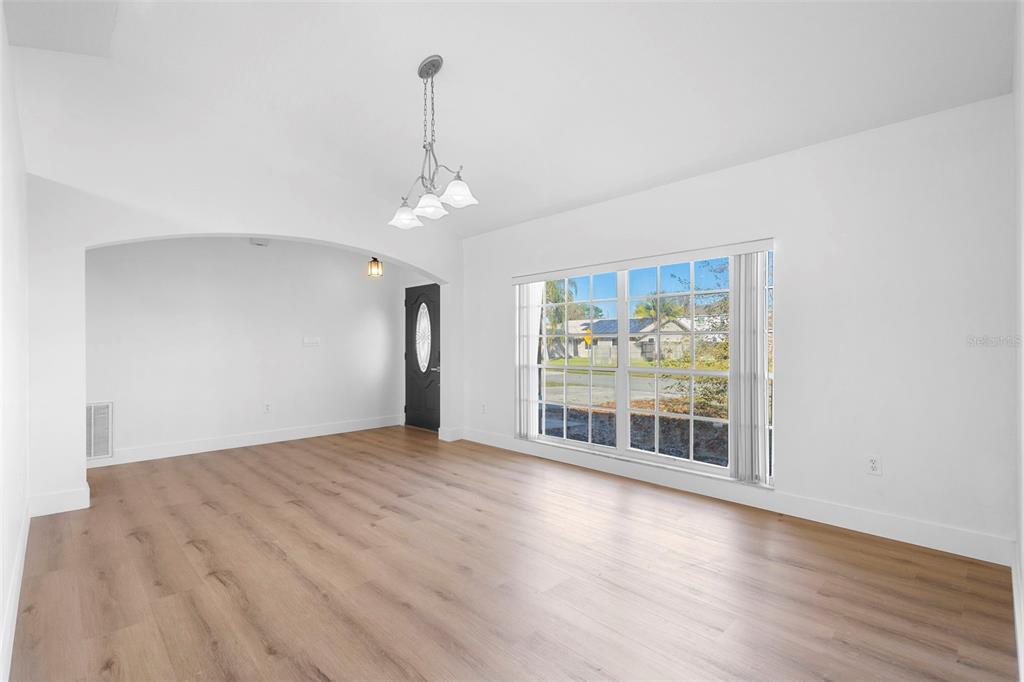 4395 Comfort Street Cocoa, FL 32927 - Photo 10 of 44 a view of an empty room with a window