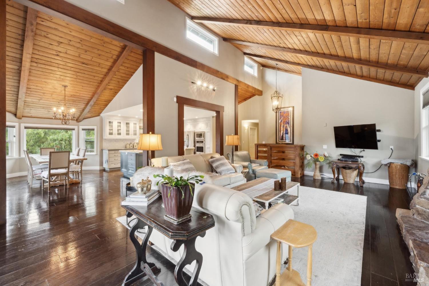 4560 Lovall Valley Loop Road Sonoma, CA 95476 - Photo 22 of 95 a living room with furniture and a flat screen tv