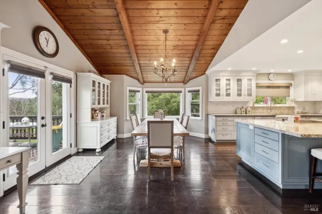 a view of living room with granite countertop furniture and fireplace