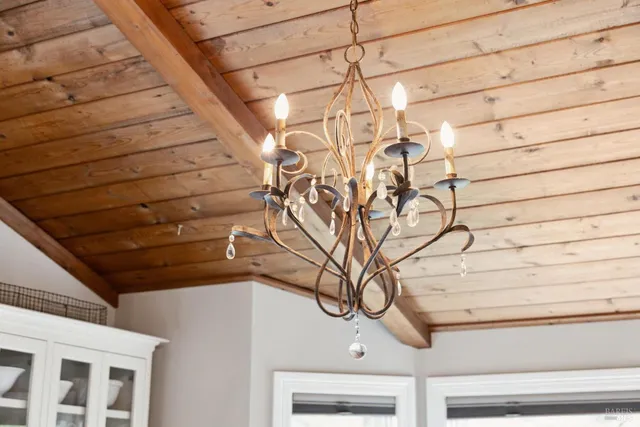 a kitchen with a sink and wooden cabinets