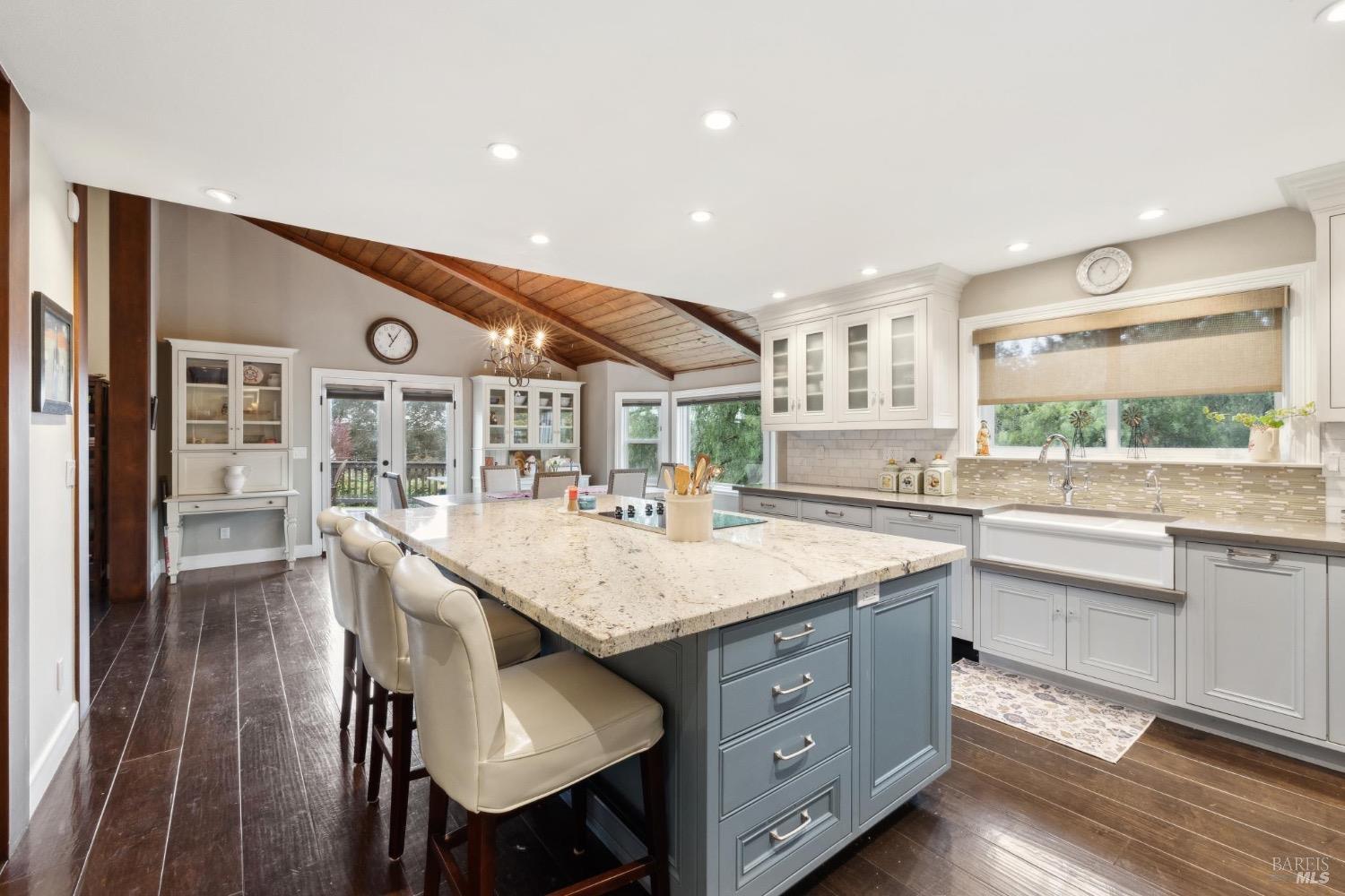4560 Lovall Valley Loop Road Sonoma, CA 95476 - Photo 35 of 95 a kitchen with a stove a sink and a refrigerator
