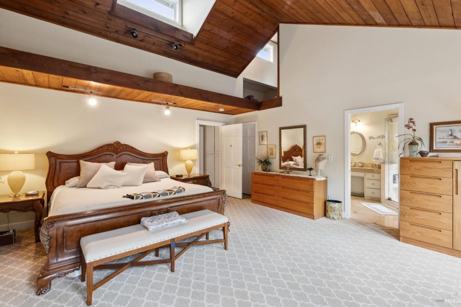 4560 Lovall Valley Loop Road Sonoma, CA 95476 - Photo 38 of 95 a bedroom with furniture and a couch