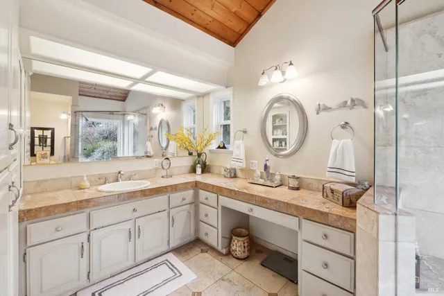 a front view of a house with swimming pool having outdoor seating