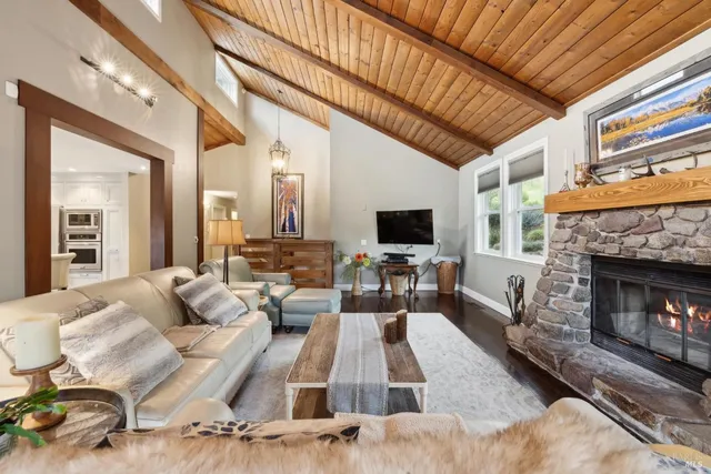 a vase with flowers sitting on a floor