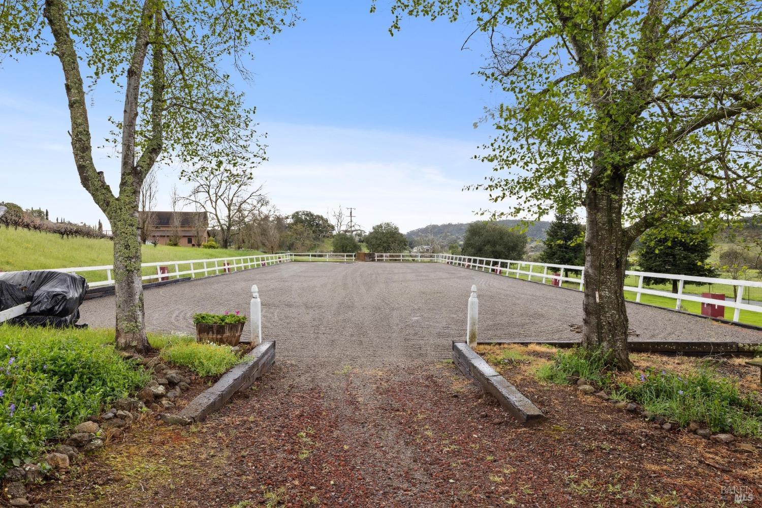 4560 Lovall Valley Loop Road Sonoma, CA 95476 - Photo 80 of 95 a view of a lake with a yard