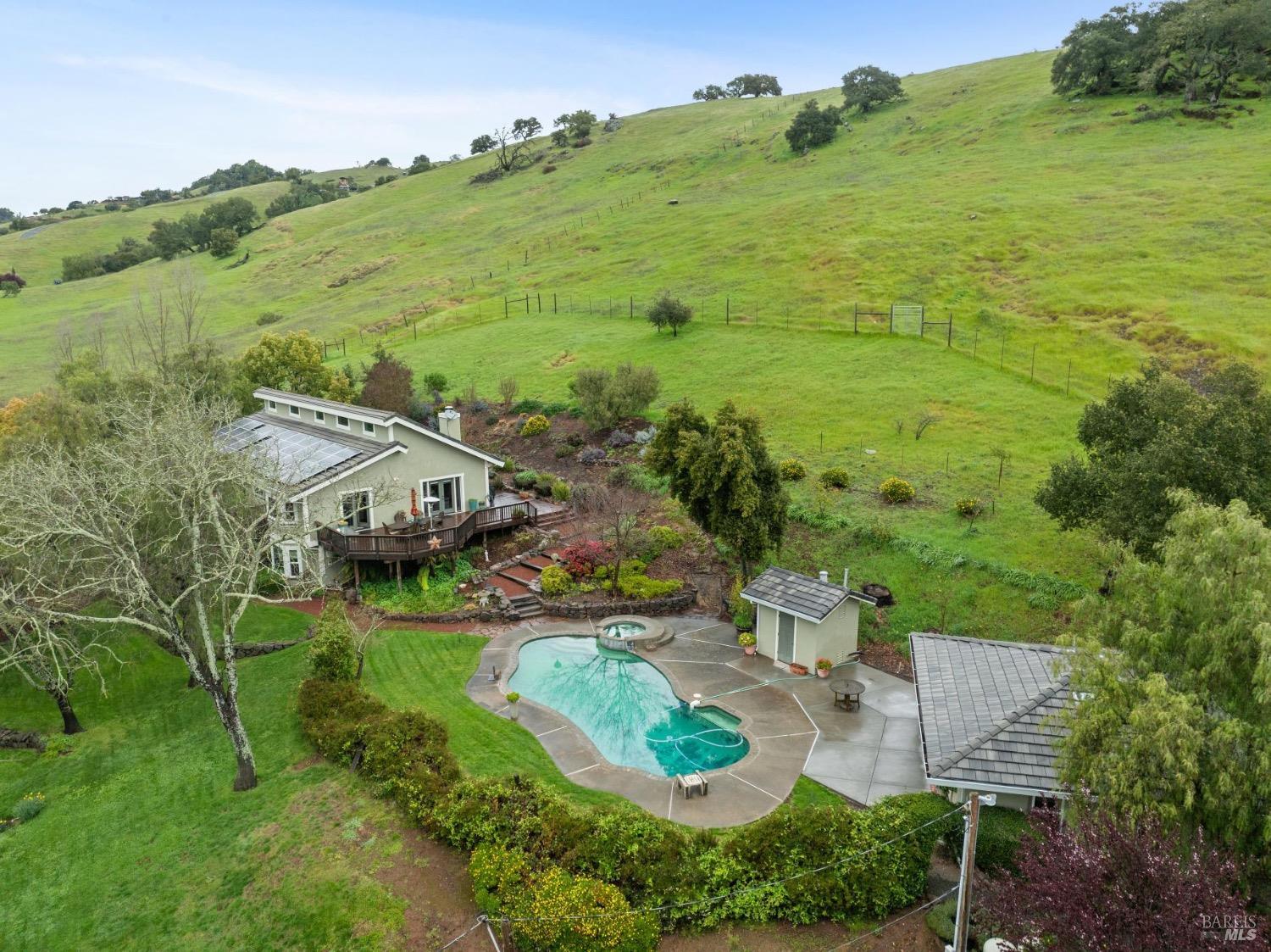 4560 Lovall Valley Loop Road Sonoma, CA 95476 - Photo 86 of 95 an aerial view of a house with garden