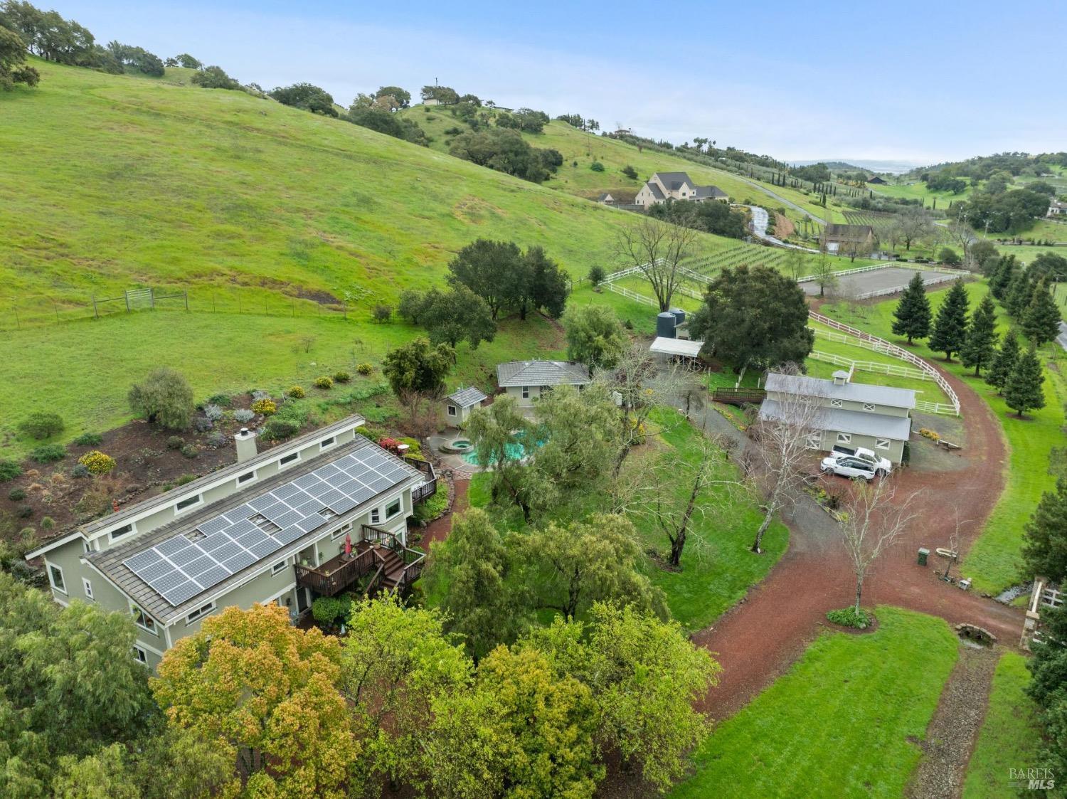 4560 Lovall Valley Loop Road Sonoma, CA 95476 - Photo 87 of 95 aerial view of a house with a garden