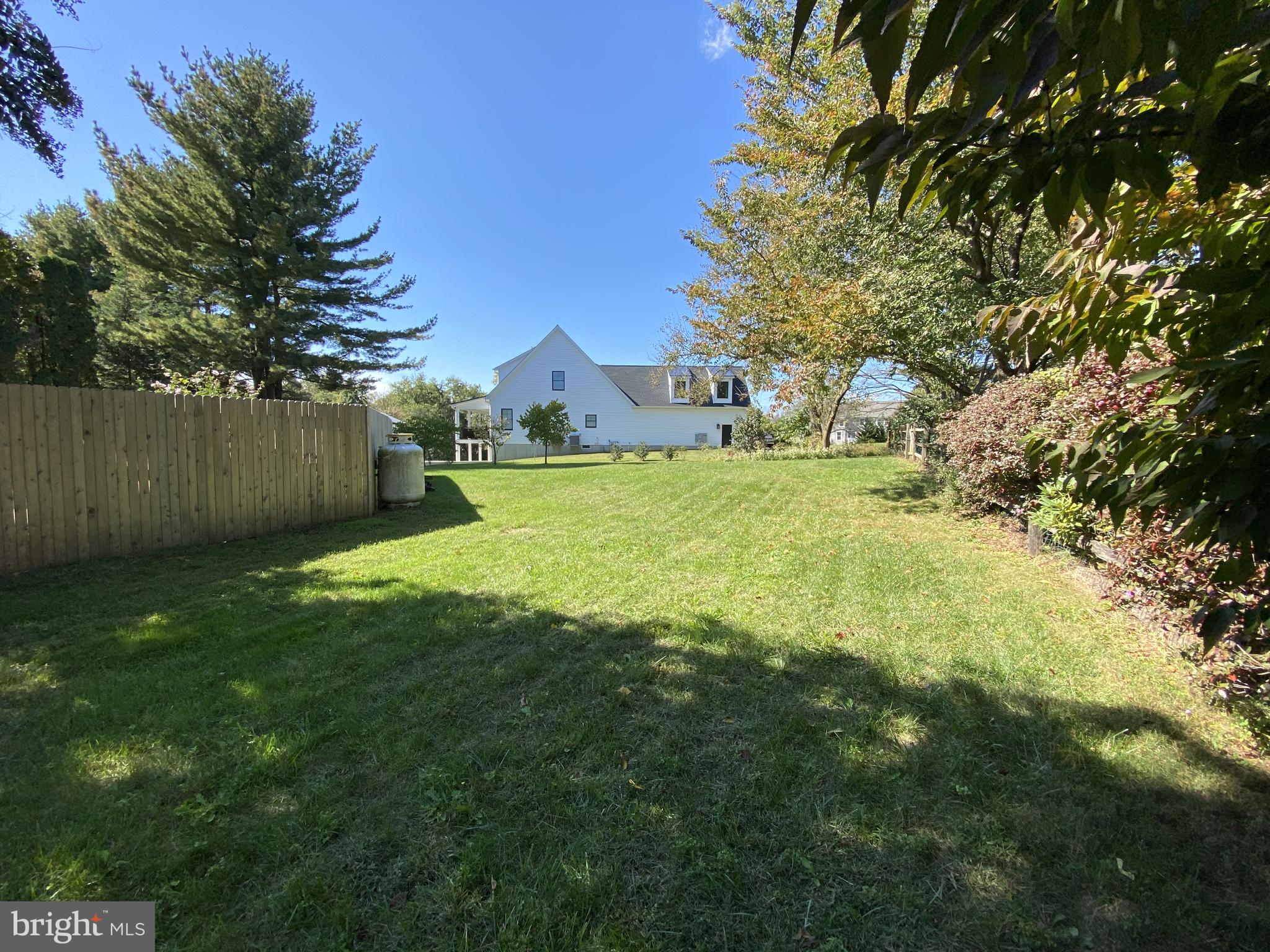 6 Kenwick Road Hockessin, DE 19707 - Photo 27 of 28 Grassy area at side and back yard
