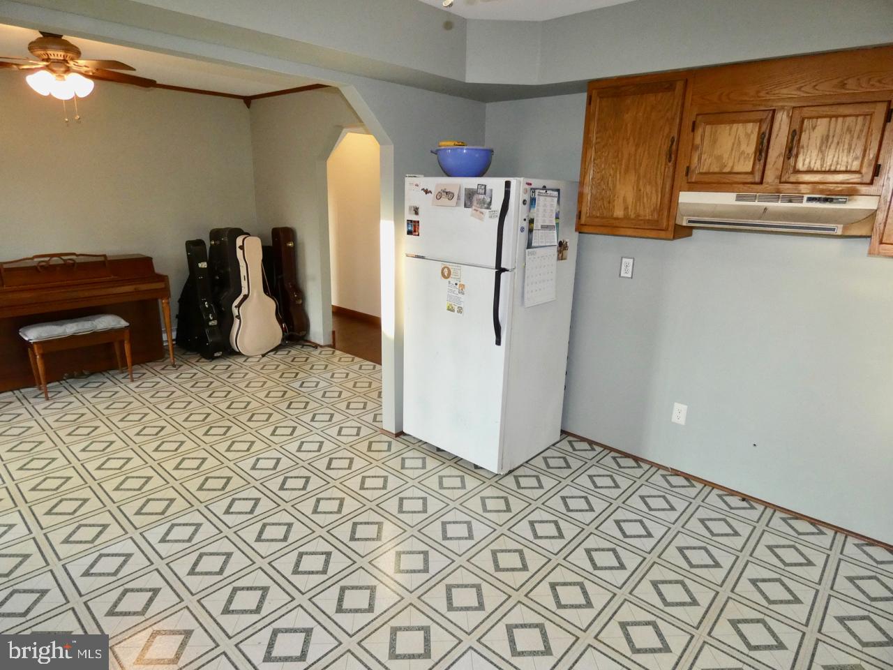 1823 Slaughter Station Road Hartly, DE 19953 - Photo 21 of 63 Kitchen w/ Dining Room View