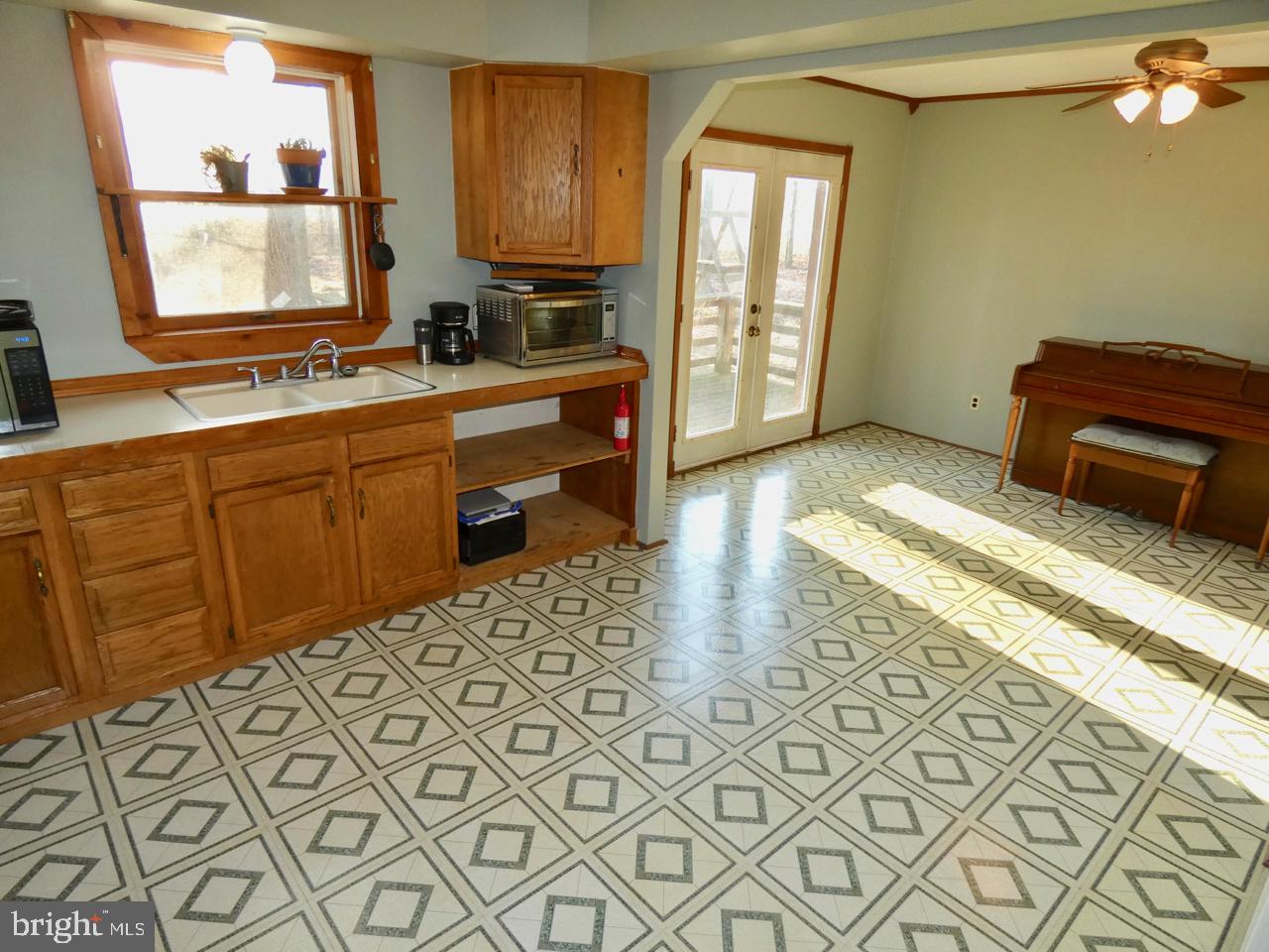 1823 Slaughter Station Road Hartly, DE 19953 - Photo 22 of 63 Kitchen w/ Dining Room View