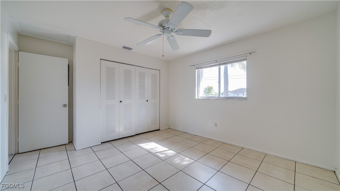 107 Southwest 16th Terrace Cape Coral, FL 33991 - Photo 21 of 31 a view of an empty room with a window