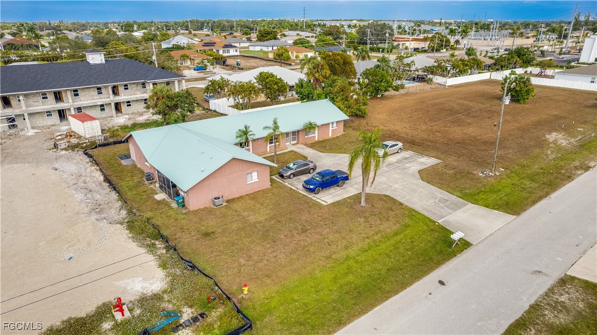 107 Southwest 16th Terrace Cape Coral, FL 33991 - Photo 30 of 31 a view of a swimming pool with seating area
