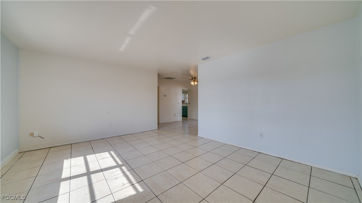 107 Southwest 16th Terrace Cape Coral, FL 33991 - Photo 8 of 31 a view of an empty room and window