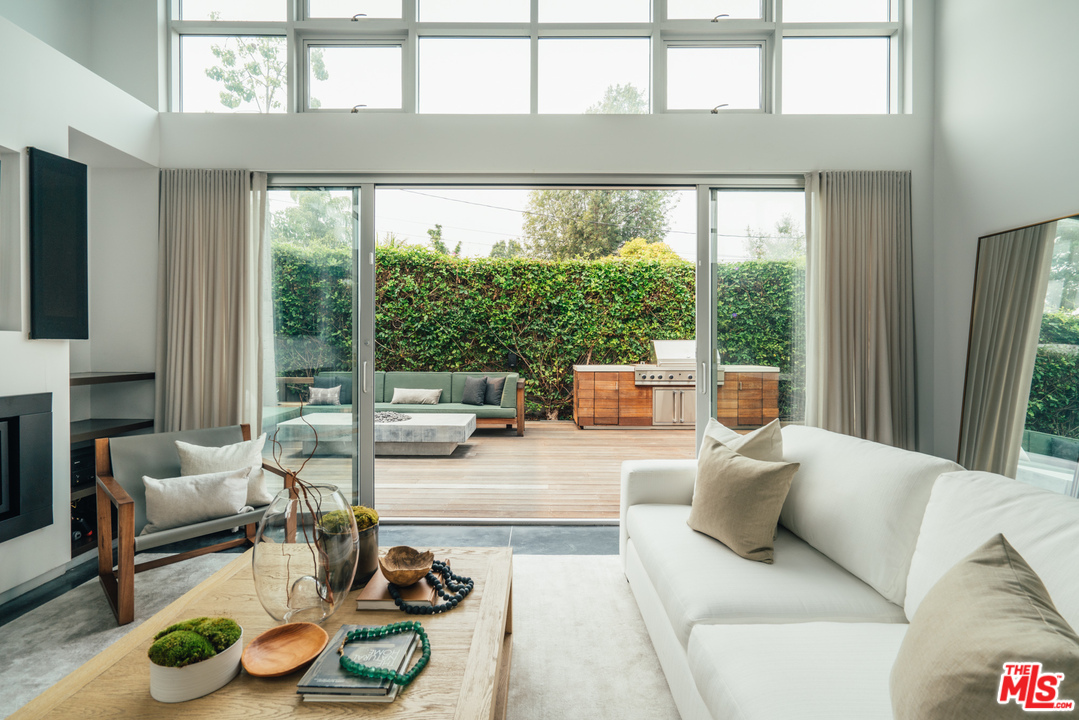 2005 Glencoe Avenue Venice, CA 90291 - Photo 11 of 34 a living room with furniture and a large window
