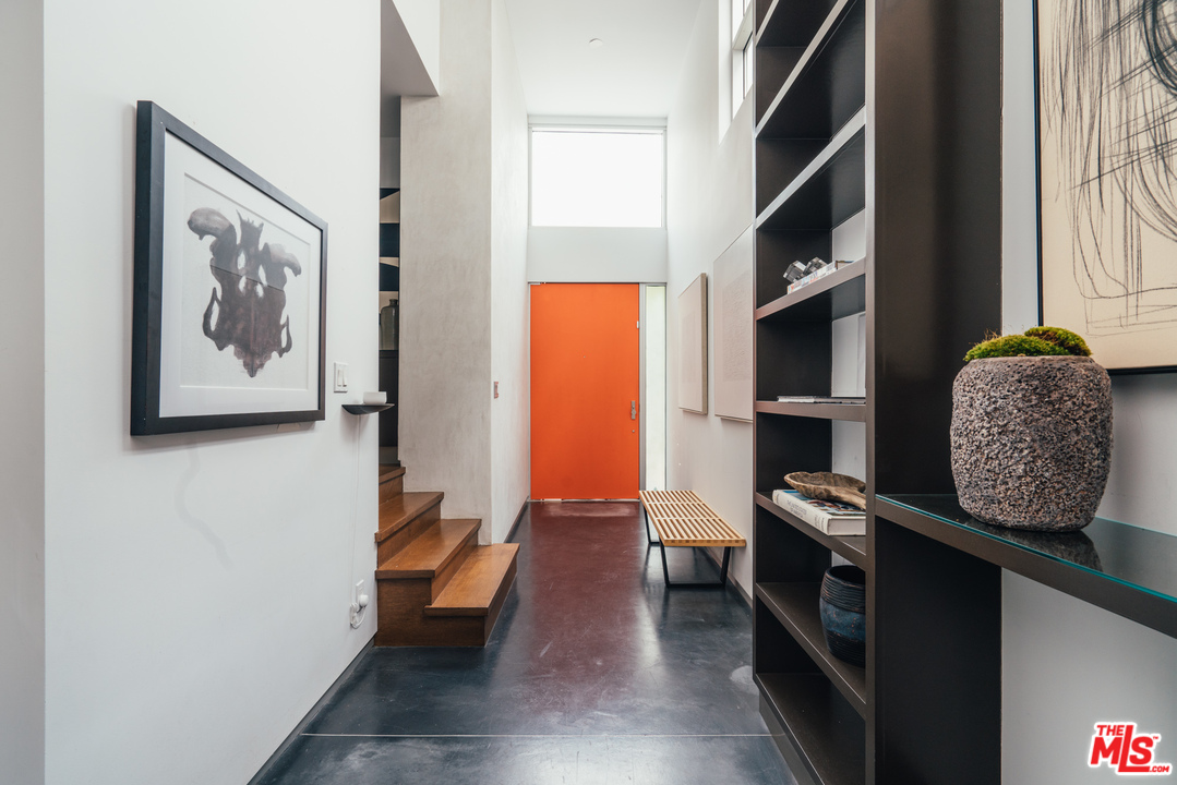 2005 Glencoe Avenue Venice, CA 90291 - Photo 3 of 34 a living room with furniture and a painting on the wall