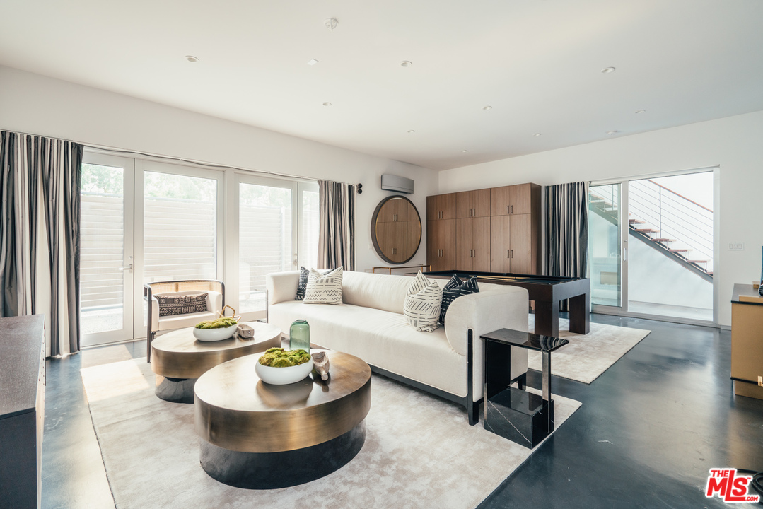2005 Glencoe Avenue Venice, CA 90291 - Photo 26 of 34 a living room with furniture and a large window