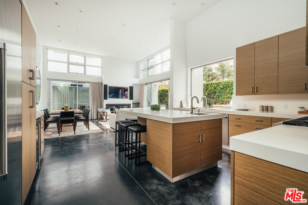 2005 Glencoe Avenue Venice, CA 90291 - Photo 8 of 34 a kitchen with sink cabinets and wooden floor