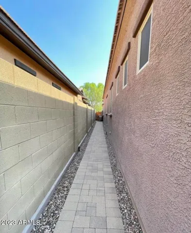 a view of a pathway both side of building