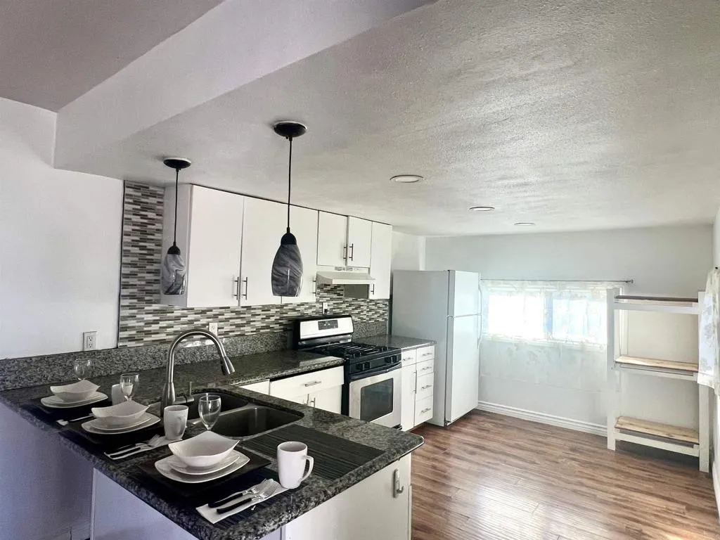 10707 Jamacha Spring Valley, Unit 72 Spring Valley, CA 91978 - Photo 15 of 18 a kitchen with granite countertop lots of counter top space
