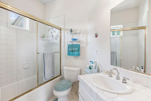 a view of a house with a yard and garage