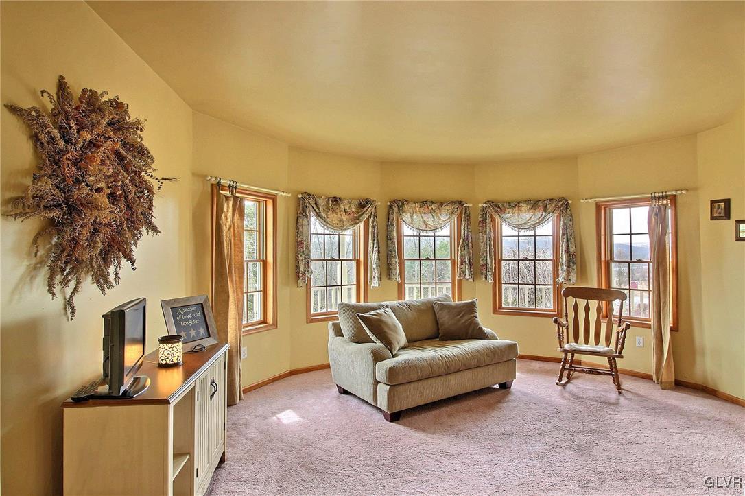 1662 Rachel Road Stroudsburg, PA 18360 - Photo 32 of 44 a living room with furniture and a flat screen tv