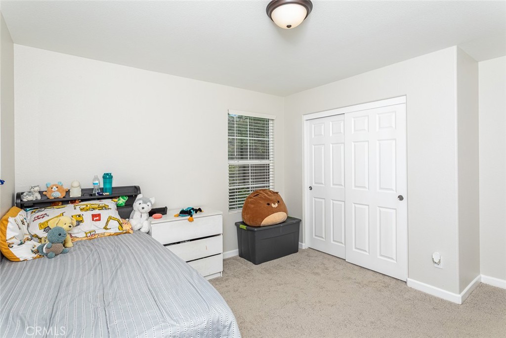 17122 Broken Rock Court Riverside, CA 92503 - Photo 21 of 61 a view of a livingroom with toys