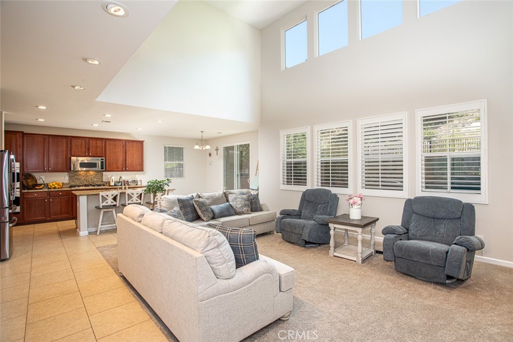 17122 Broken Rock Court Riverside, CA 92503 - Photo 7 of 61 a living room with furniture and a large window