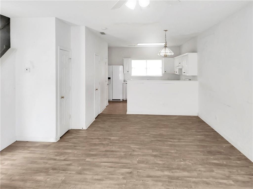 6710 Sunset Hills Boulevard Rex, GA 30273 - Photo 4 of 12 a view of a kitchen with wooden floor