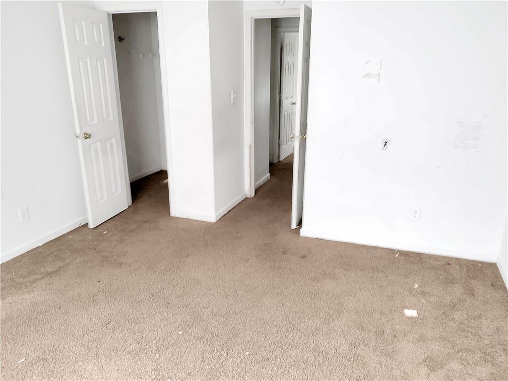 6710 Sunset Hills Boulevard Rex, GA 30273 - Photo 9 of 12 a view of a room with a hallway