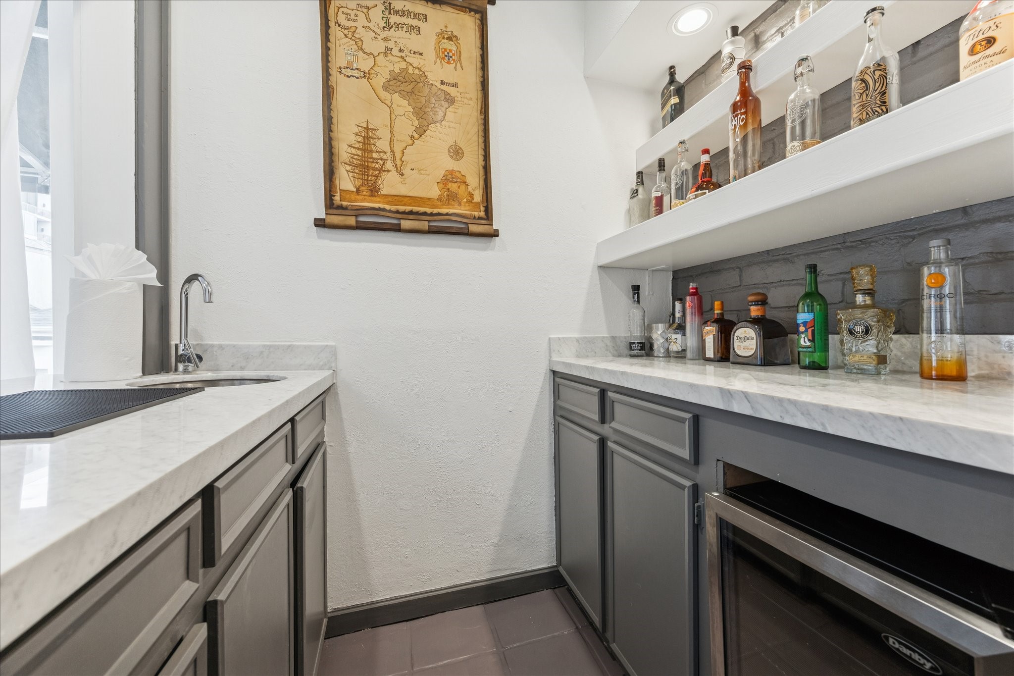 2421 Branard Street Houston, TX 77098 - Photo 19 of 28 a kitchen with a sink and cabinets