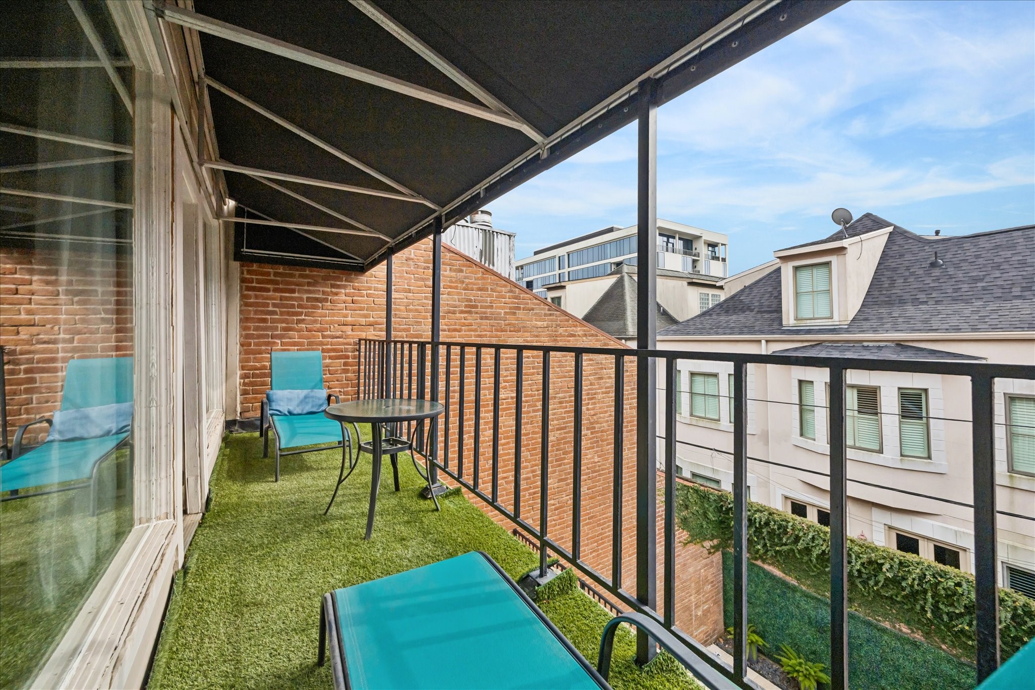 2421 Branard Street Houston, TX 77098 - Photo 23 of 28 a view of porch with a bench next to a yard