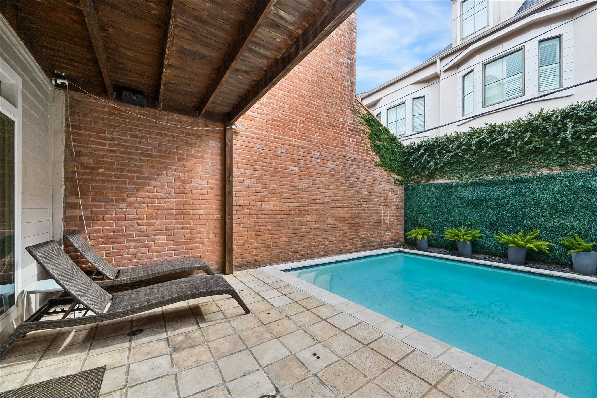 2421 Branard Street Houston, TX 77098 - Photo 26 of 28 a view of backyard with trampoline